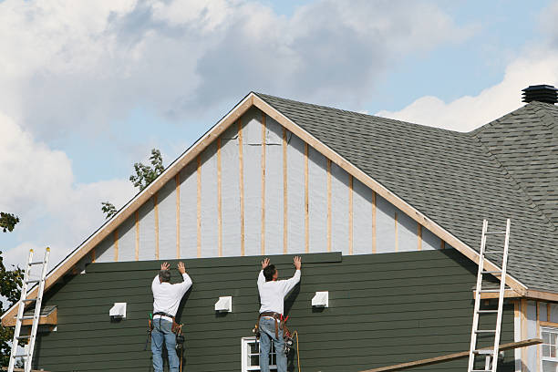 Professional Siding Replacement technician working in Pine Level, NC